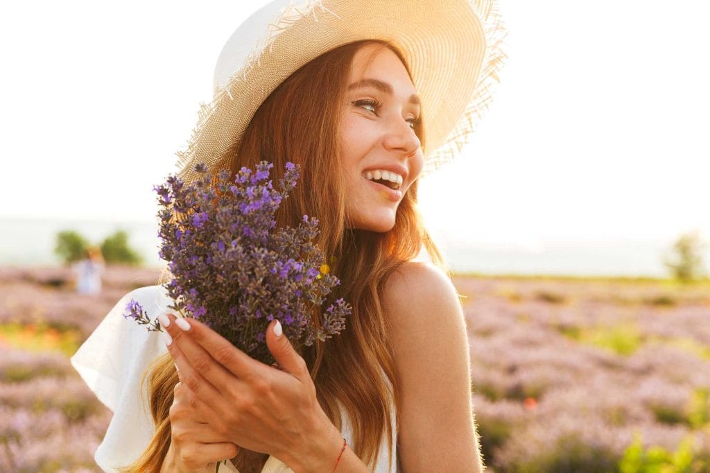 confident girl smiles in golden sunset