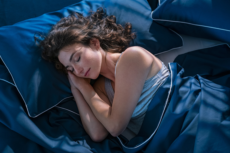woman sleeping on her side stop snore remedy