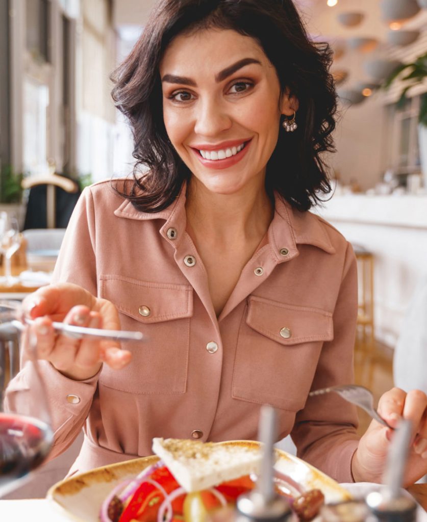 lady with veneers smiling at camera